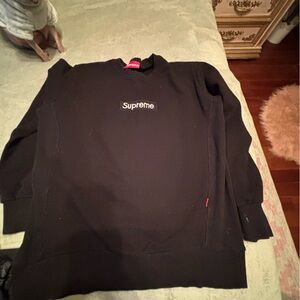 Supreme Black Crewneck with Red Tag